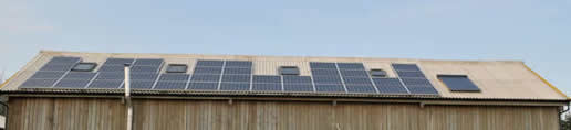 Photograph of photovoltaic panels on a barn roof