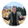 Photograph of Hugh Fearnley Whittingstall with an enormous pile of rejected parsnips